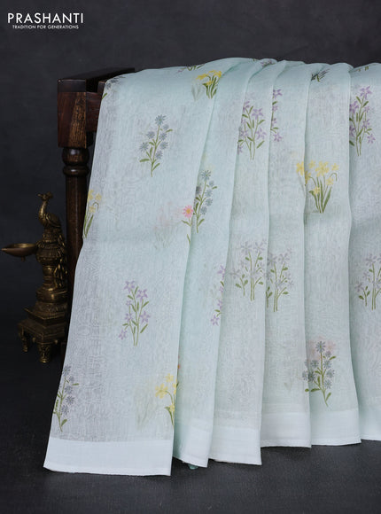 Pure linen silk saree mild teal with floral digital butta prints and simple border