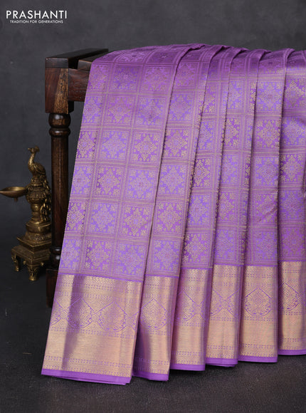 Pure kanchipuram silk saree lavander with allover zari woven brocade weaves and zari woven border