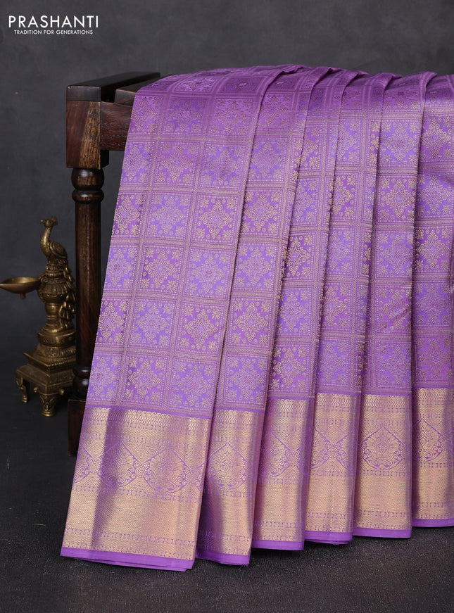 Pure kanchipuram silk saree lavander with allover zari woven brocade weaves and zari woven border