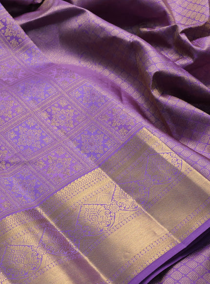 Pure kanchipuram silk saree lavander with allover zari woven brocade weaves and zari woven border