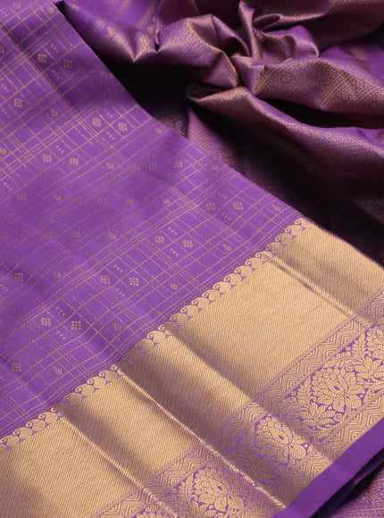 Pure kanchipuram silk saree lavander with allover zari checks & buttas and rich zari woven border