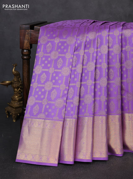 Pure kanchipuram silk saree lavander with allover zari woven brocade weaves and zari woven border
