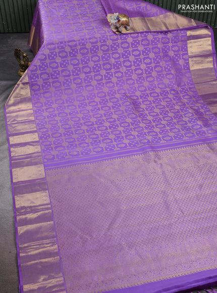 Pure kanchipuram silk saree lavander with allover zari woven brocade weaves and zari woven border