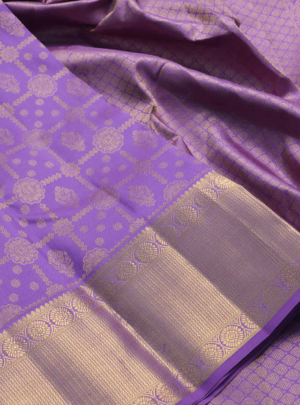 Pure kanchipuram silk saree lavander with allover zari woven brocade weaves and zari woven border