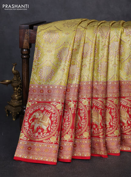Pure kanchipuram tissue silk saree lime green and red with allover zari woven brocade weaves and long elephant zari woven border