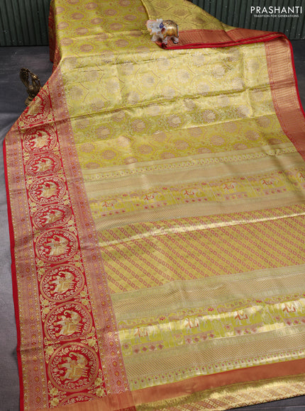 Pure kanchipuram tissue silk saree lime green and red with allover zari woven brocade weaves and long elephant zari woven border