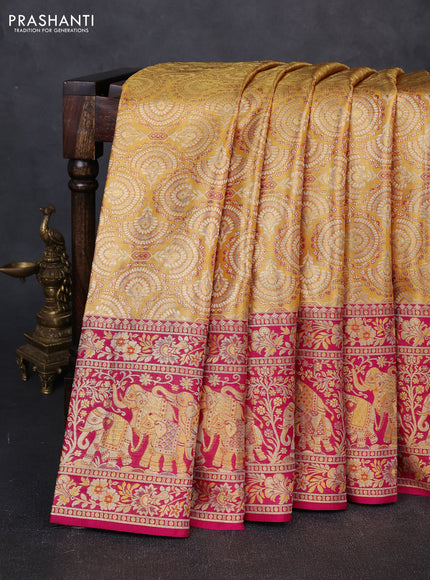 Pure kanchipuram tissue silk saree mustard yellow and pink with allover zari woven brocade weaves and long elephant zari woven border