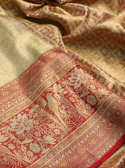 Pure kanchipuram tissue silk saree gold and red with allover zari woven brocade weaves and rich parrot zari woven border