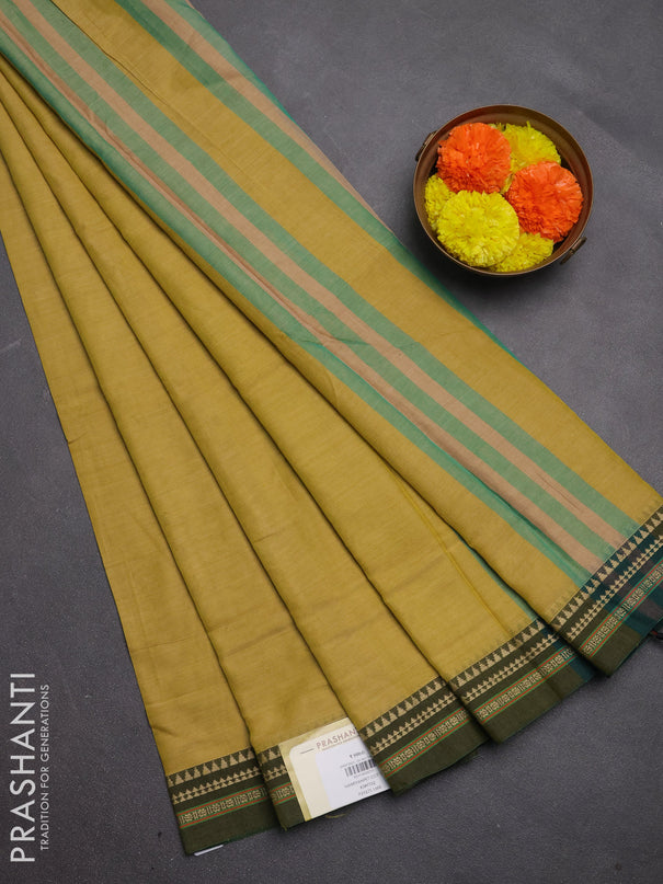 Narayanpet cotton saree mustard shade and olive green with plain body and temple design thread woven border