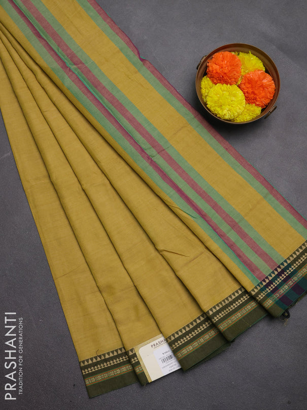 Narayanpet cotton saree mustard shade and olive green with plain body and temple design thread woven border