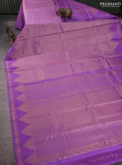 Pure kanchipuram silk saree lavender with plain body and temple design zari woven border