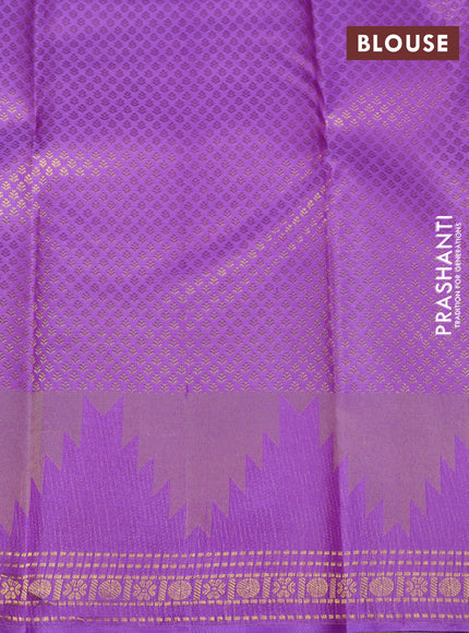 Pure kanchipuram silk saree lavender with plain body and temple design zari woven border
