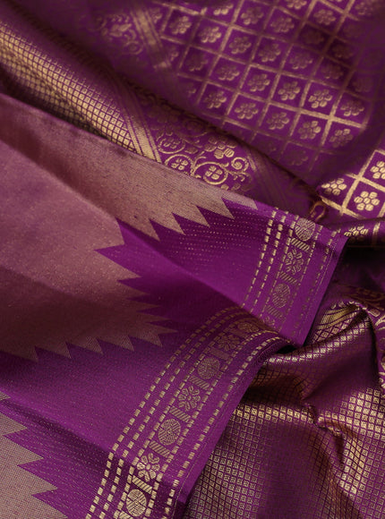 Pure kanchipuram tissue silk saree purple with plain body and temple design zari woven border
