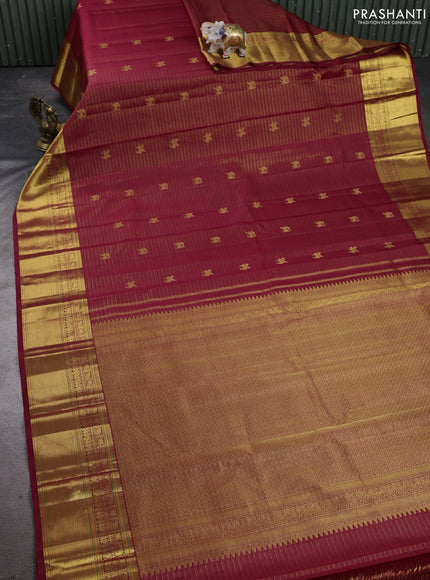 Pure kanchipuram silk saree maroon with allover vairaosi pattern & buttas and rich zari woven border