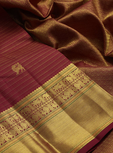Pure kanchipuram silk saree maroon with allover vairaosi pattern & buttas and rich zari woven border