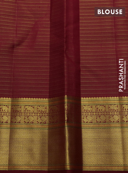 Pure kanchipuram silk saree maroon with allover vairaosi pattern & buttas and rich zari woven border