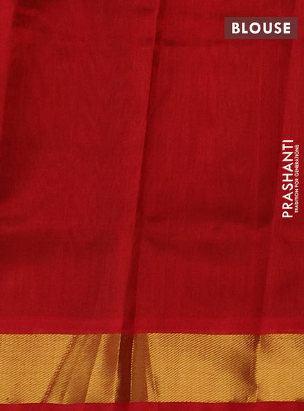 Silk cotton saree dual shade of manthulir green and red with rudhraksha zari woven buttas and zari woven border