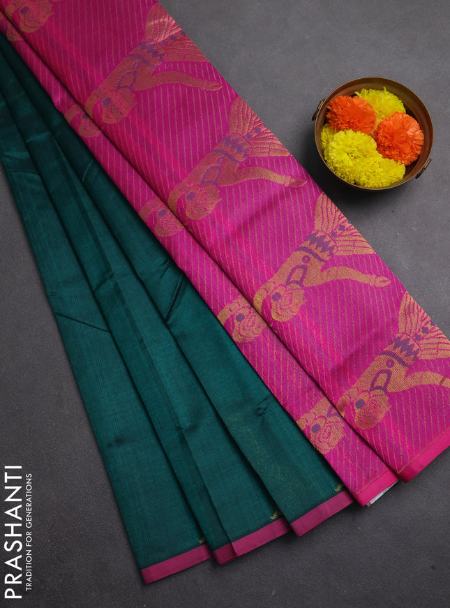 Silk cotton saree green and magenta pink with zari woven buttas and zari woven butta border