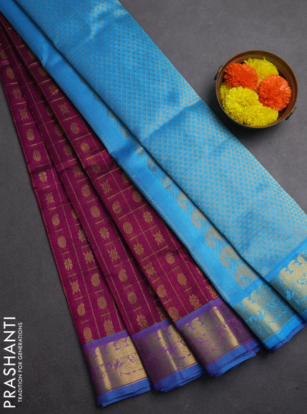 Silk cotton saree purple and cs blue with allover zari checks & buttas and zari woven border