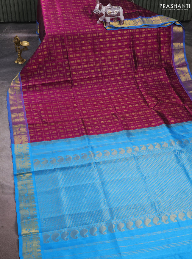 Silk cotton saree purple and cs blue with allover zari checks & buttas and zari woven border