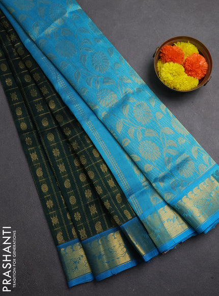Silk cotton saree bottle green and cs blue with allover zari checks & buttas and zari woven border