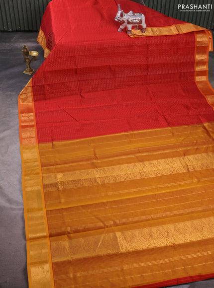 Silk cotton saree red and dark mustard with allover lakshadeepam pattern and zari woven border