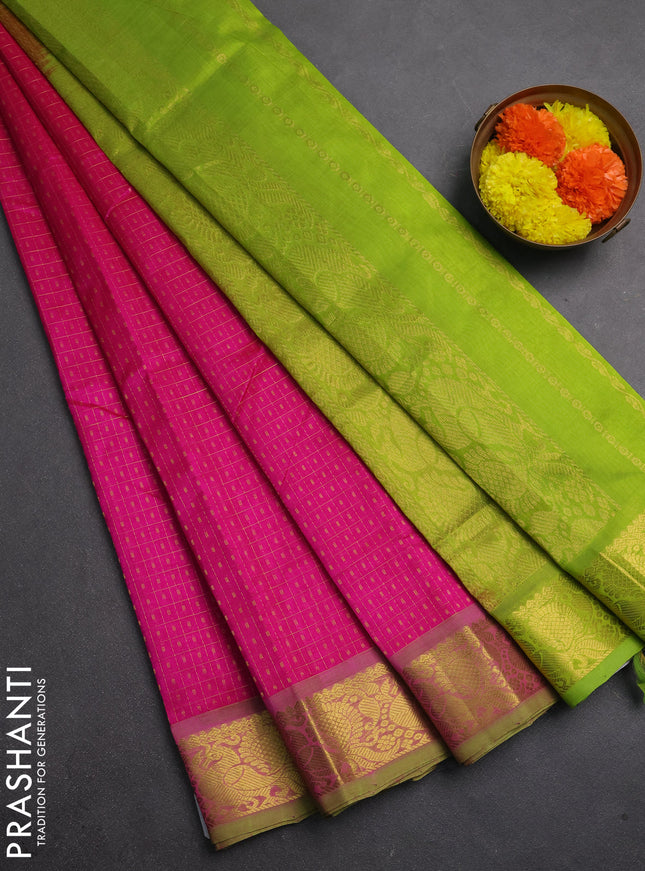 Silk cotton saree pink and light green with allover lakshadeepam pattern and zari woven border