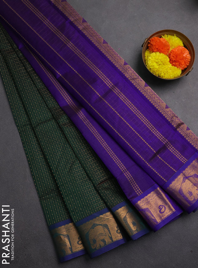 Silk cotton saree bottle green and violet with allover lakshadeepam pattern and zari woven border