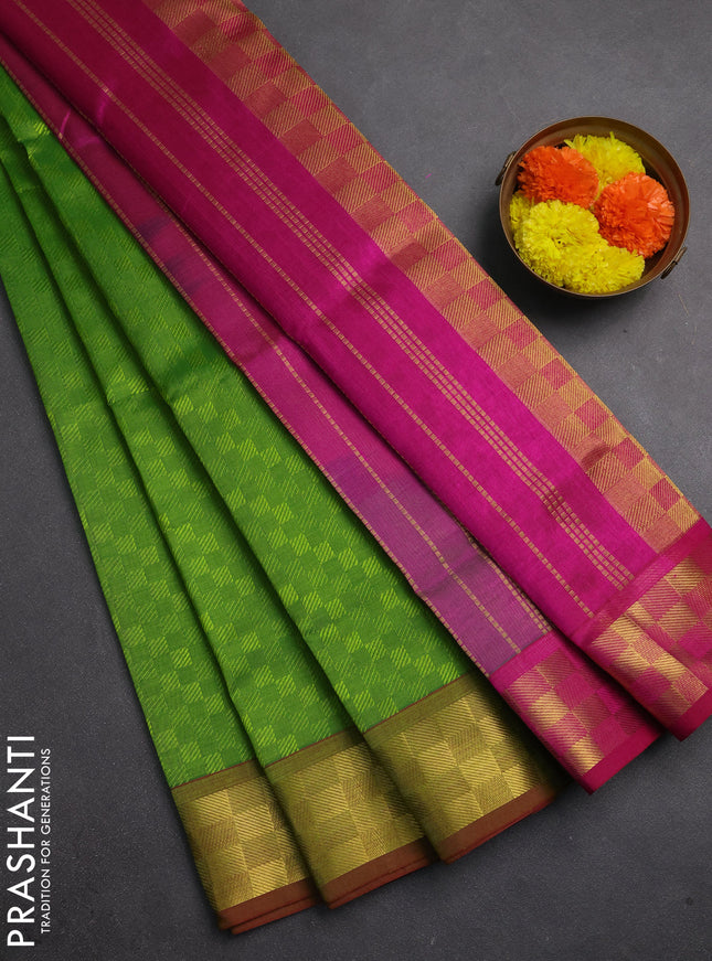 Silk cotton saree light green and dark magenta pink with allover self emboss jacquard and zari woven border