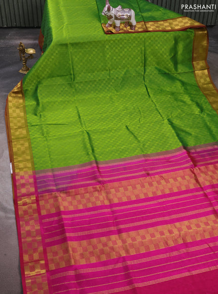 Silk cotton saree light green and dark magenta pink with allover self emboss jacquard and zari woven border