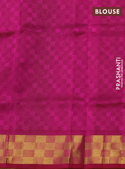 Silk cotton saree light green and dark magenta pink with allover self emboss jacquard and zari woven border