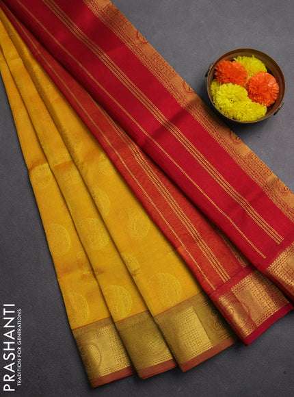 Silk cotton saree mango yellow and maroon with allover self emboss jacquard and zari woven border