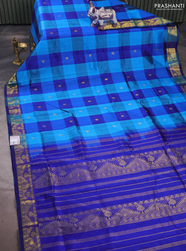 Silk cotton saree cs blue and blue with allover paalum pazhamum checks & zari buttas and temple & paisley zari woven border