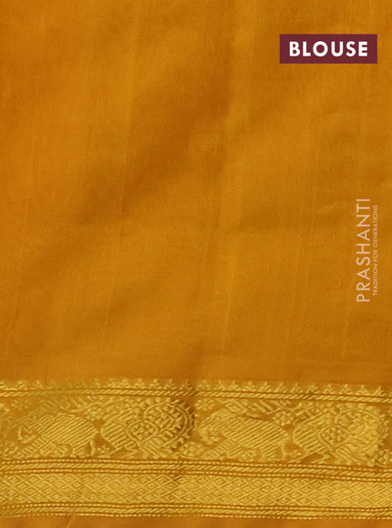 Silk cotton saree multi colour and mustard yellow with allover paalum pazhamum checks & zari buttas and temple & paisley zari woven border