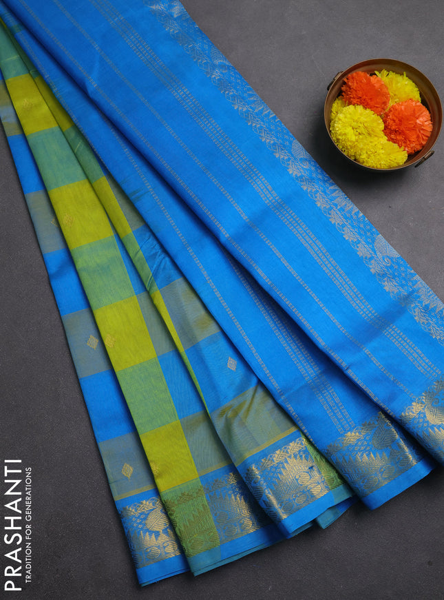 Silk cotton saree lime yellow and cs blue with allover paalum pazhamum checks & zari buttas and temple & paisley zari woven border