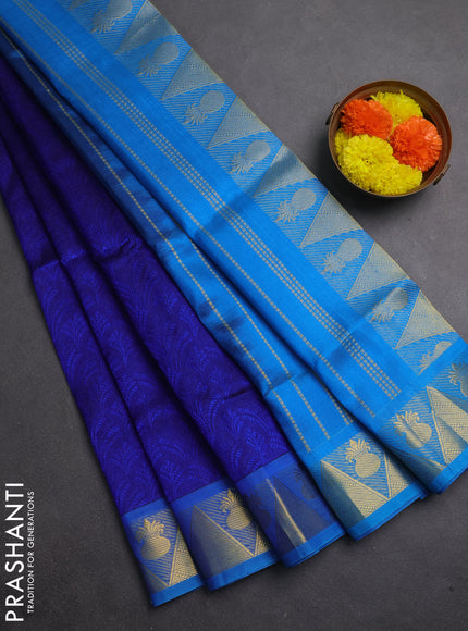 Silk cotton saree blue and cs blue with allover self emboss jacquard and zari woven border