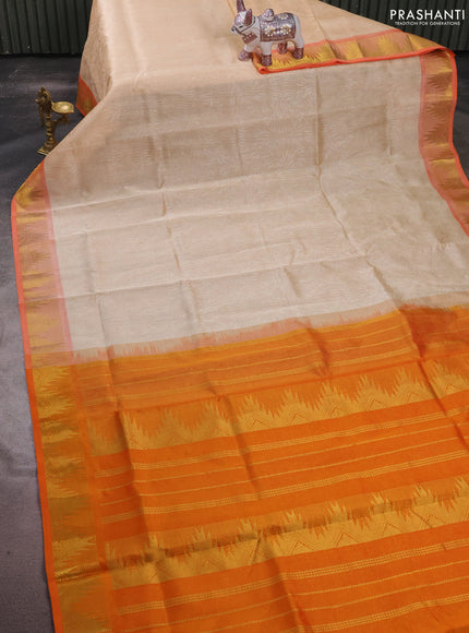 Silk cotton saree cream and orange with allover self emboss jacquard and zari woven border