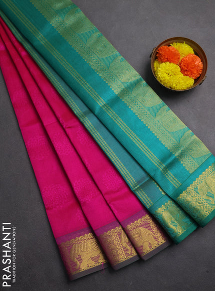 Silk cotton saree pink and teal green with allover self emboss jacquard and elephant zari woven border
