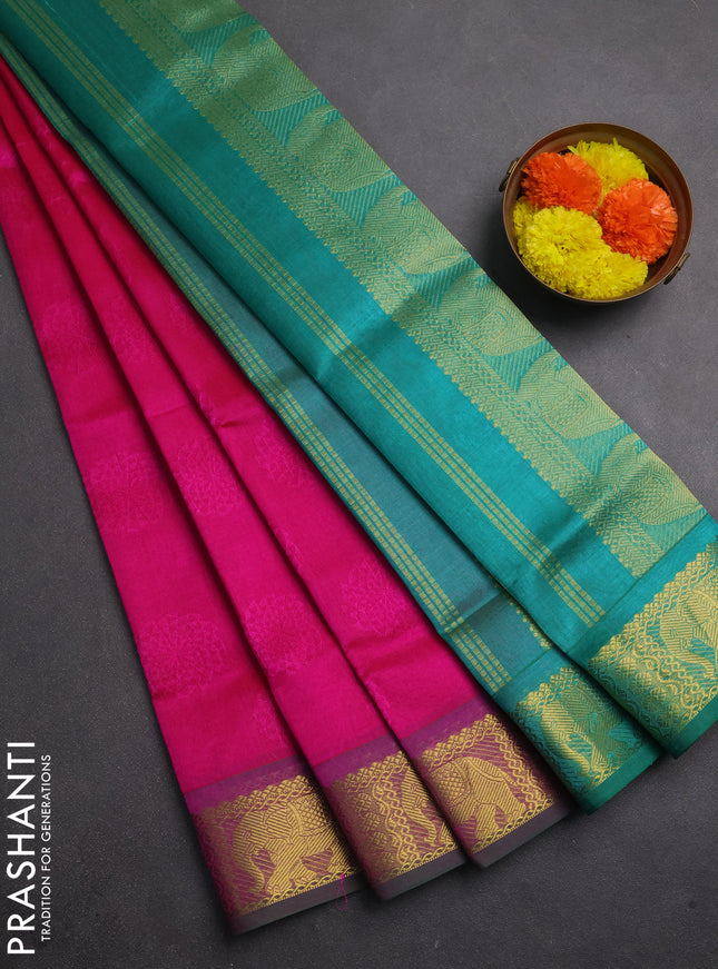 Silk cotton saree pink and teal green with allover self emboss jacquard and elephant zari woven border