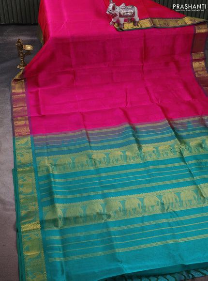Silk cotton saree pink and teal green with allover self emboss jacquard and elephant zari woven border