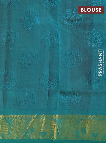 Silk cotton saree pink and teal green with allover self emboss jacquard and elephant zari woven border