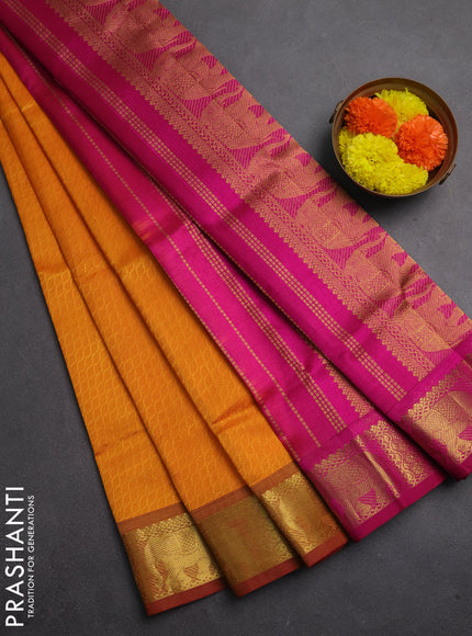 Silk cotton saree mango yellow and magenta pink with allover self emboss jacquard and elephant zari woven border