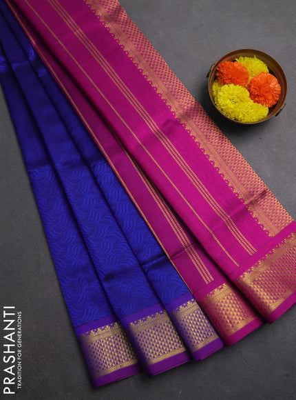 Silk cotton saree blue and purple with allover self emboss jacquard and zari woven border