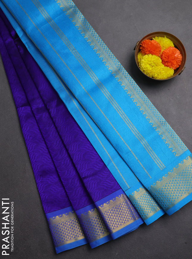 Silk cotton saree violet and cs blue with allover self emboss jacquard and zari woven border