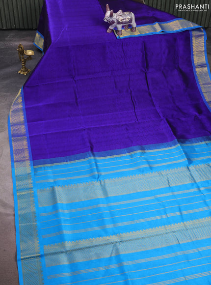 Silk cotton saree violet and cs blue with allover self emboss jacquard and zari woven border