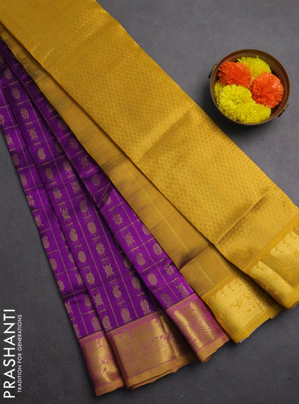 Silk cotton saree purple and mustard yellow with allover zari checks & buttas and zari woven border