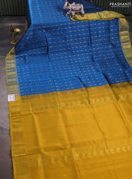 Silk cotton saree cs blue and mustard yellow with allover zari checks & buttas and zari woven border