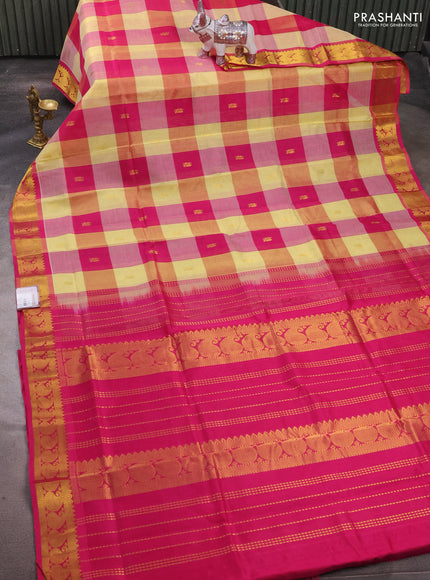 Silk cotton saree pale yellow and pink with allover paalum pazhamum checks & zari buttas and paisley zari woven border
