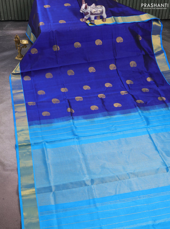 Silk cotton saree blue and cs blue with paisley zari woven buttas and zari woven border