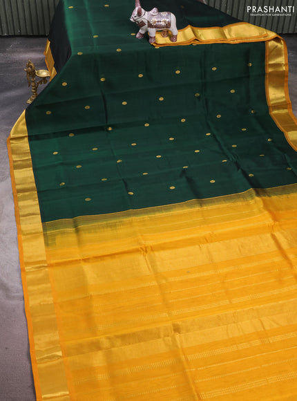 Silk cotton saree bottle green and mango yellow with zari woven buttas and zari woven border